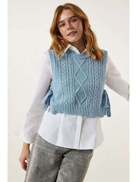 Happiness Istanbul Bezrękawnik w kolorze błękitnym rozmiar: S/M. Niebieskie swetry Happiness Istanbul, m, bez wzorów, ze splotem, bez ramiączek. Za 65.85 zł.