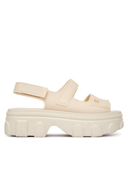 Melissa Sandały Melissa Ella Move Ad 36150 Beżowy. Brązowe sandały Melissa, bez wzorów, z tworzywa sztucznego, bez obcasa, na koturnie, bez zapięcia. Za 496.99 zł.
