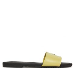 Klapki Calvin Klein Jeans. Żółte klapki Calvin Klein Jeans, bez wzorów, z jeansu, bez obcasa. Za 229.99 zł.