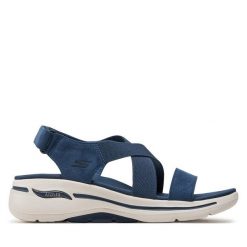 Sandały Skechers. Niebieskie sandały Skechers, bez wzorów, bez obcasa, na płaskiej podeszwie, bez zapięcia. Za 339.99 zł.