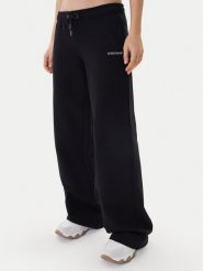 Guess Jeans Spodnie dresowe W6RB52 K68I4 Czarny Regular Fit. Czarne spodnie dresowe Guess Jeans, s, z aplikacjami, z bawełny. Za 299.99 zł.