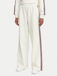 Tommy Hilfiger Spodnie dresowe UW0UW06628 Kremowy Wide Leg. Białe spodnie dresowe TOMMY HILFIGER, s, bez wzorów, z bawełny. Za 329.99 zł.