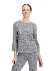 CARTOON Bluzka w kolorze biało-granatowym rozmiar: 42. Białe bluzki Cartoon, bez wzorów, bez kołnierzyka, bez ramiączek. Za 104.99 zł.