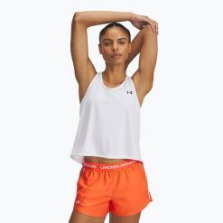 Top treningowy damski Under Armour Tech Swing Tank. Białe topy Under Armour, m, bez wzorów, bez kołnierzyka, bez ramiączek. Za 79.99 zł.