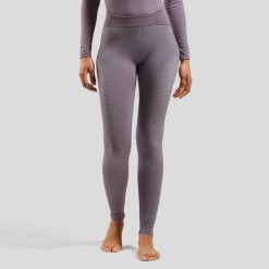 Spodnie termoaktywne damskie ODLO Performance Warm Bl Bottom Long. Fioletowe spodnie narciarskie Odlo, s, bez wzorów, z elastanu, narciarskie. Za 309.99 zł.