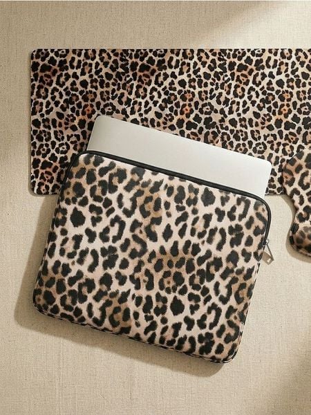 Torba na laptopa w panterkę - brązowy. Brązowe torby na laptopa Sinsay, bez wzorów. Za 27.99 zł.