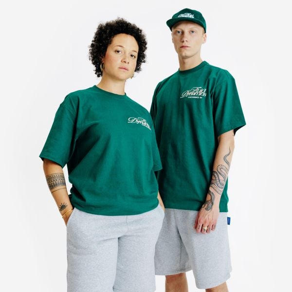 Koszulka z grafiką. Zielone bluzki DECATHLON, xl, bez wzorów, z bawełny, bez kołnierzyka, bez ramiączek. W wyprzedaży za 59.99 zł.