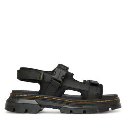 Sandały Dr. Martens. Czarne sandały Dr. Martens, bez wzorów, bez obcasa, na płaskiej podeszwie, bez zapięcia. Za 589.99 zł.