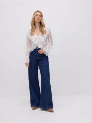 Jeansy wide leg z przeszyciami - granatowy. Niebieskie jeansy Reserved, bez wzorów, z podwyższonym stanem. W wyprzedaży za 89.99 zł.