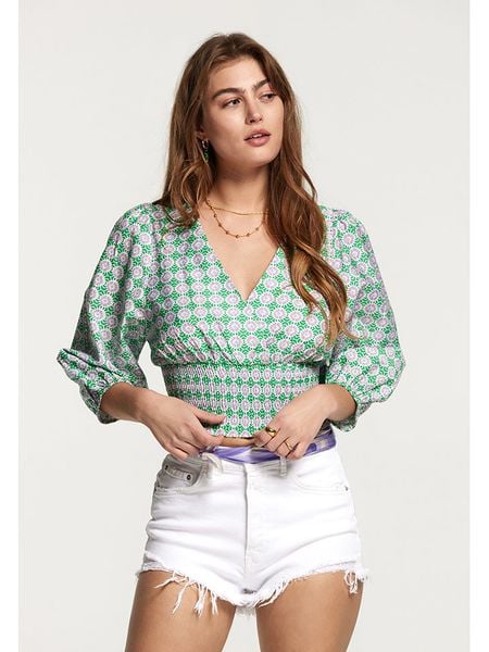 SHIWI Bluzka w kolorze zielono-fioletowym rozmiar: L. Różowe bluzki SHIWI, l, bez wzorów, bez kołnierzyka, bez ramiączek. Za 91.77 zł.