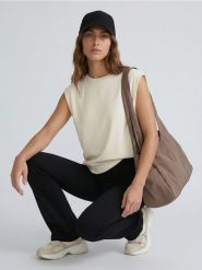 Legginsy flare z dzianiny technicznej - czarny. Czarne legginsy Sinsay, l, bez wzorów, z dzianiny. Za 39.99 zł.