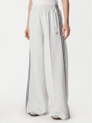 Adidas Spodnie dresowe Spacer HY8044 Szary jasny Wide Leg. Szare spodnie dresowe Adidas, xs, bez wzorów, z dresówki. Za 222.99 zł.