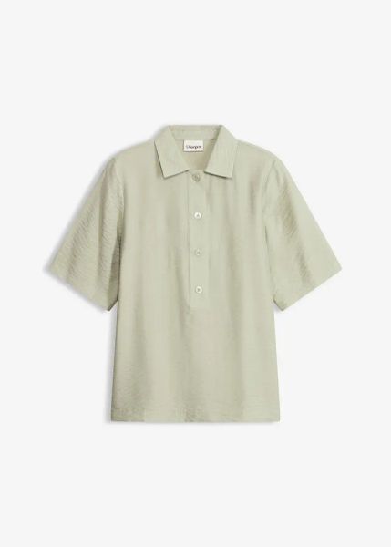 Bluzka w stylu tuniki, lekko prześwitująca. Białe bluzki bonprix, bez wzorów, bez kołnierzyka, bez ramiączek. Za 37.99 zł.