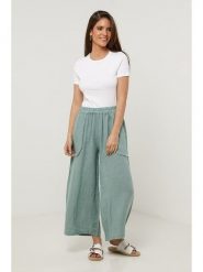 Lin Passion Lniane spodnie w kolorze zielonym rozmiar: 36/38. Zielone spodnie materiałowe Lin Passion, bez wzorów, ze lnu, z standardowym stanem. Za 121.99 zł.