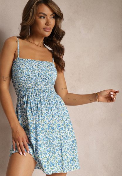 Biało-Niebieska Sukienka z Bawełny na Cienkich Ramiączkach z Gumką w Talii Tessinia. Białe sukienki Renee, na co dzień, l, bez wzorów, z bawełny, eleganckie, bez kołnierzyka, bez ramiączek, mini. Za 29.99 zł.