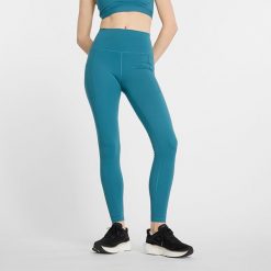 Legginsy damskie New Balance WP41275TEI – niebieskie. Niebieskie legginsy sportowe New Balance, m, bez wzorów, z materiału, z podwyższonym stanem, na fitness i siłownię. Za 169.99 zł.