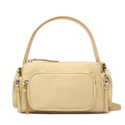 Torebka Calvin Klein. Żółte torebki klasyczne Calvin Klein, bez wzorów, z nylonu, bez dodatków. Za 449.99 zł.