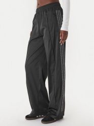 Adidas Spodnie dresowe Pearl Firebird KC7863 Czarny Loose Fit. Czarne spodnie dresowe Adidas, xs, bez wzorów, z dresówki. Za 348.99 zł.