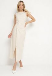 Jasnobeżowa Sukienka Dopasowana z Bawełną i Wiskozą z Rozcięciem Turilia. Brązowe sukienki Born2be, na co dzień, s, bez wzorów, z bawełny, eleganckie, bez kołnierzyka, bez ramiączek, maxi, dopasowane. Za 99.99 zł.