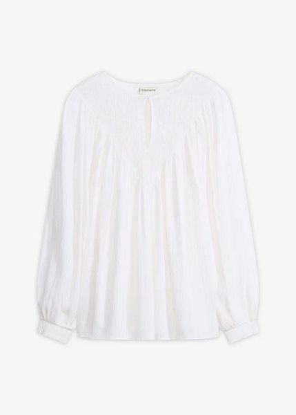 Tunika z haftem. Białe tuniki bonprix, bez wzorów, bez kołnierzyka, bez ramiączek. Za 54.99 zł.