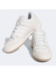Adidas Skórzane sneakersy "Forum Low" w kolorze kremowym rozmiar: 38,5. Brązowe trampki Adidas, bez wzorów, bez zapięcia. Za 333.03 zł.