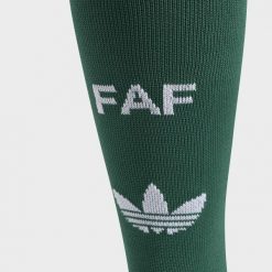Getry wyjazdowe Algieria 26. Zielone legginsy sportowe Adidas, l, bez wzorów, z bawełny, do piłki nożnej. Za 79.95 zł.