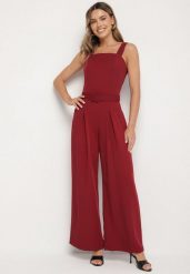 Bordowy Taliowany Kombinezon z Ozdobnym Paskiem i Klamrą Doloriela. Czerwone sukienki Born2be, l, bez wzorów, eleganckie, bez kołnierzyka, bez ramiączek. Za 139.99 zł.