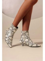 C'M Botki w kolorze kremowym rozmiar: 41. Brązowe botki C'M, bez wzorów, bez obcasa, na szpilce, bez zapięcia. Za 130.99 zł.