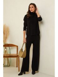 Soft Cashmere Spodnie w kolorze czarnym rozmiar: 38/40. Czarne spodnie materiałowe Soft Cashmere, bez wzorów, z kaszmiru. Za 130.99 zł.