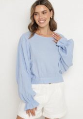 Jasnoniebieska Bluzka z Bawełny o Nietoperzowym Kroju z Wiązaniem Sepene. Niebieskie bluzki Born2be, z aplikacjami, z bawełny, eleganckie, bez kołnierzyka, bez ramiączek. W wyprzedaży za 101.99 zł.