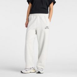 Spodnie damskie New Balance WB61W1DZAHH – szare. Szare spodnie sportowe New Balance, m, bez wzorów, z bawełny, z podwyższonym stanem. Za 279.99 zł.