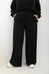Oversizowe prążkowane czarne spodnie Good Day Ahead na gumce z kieszeniami Plus Size Oversize. Czarne spodnie dresowe Moda Size Plus Iwanek, l, bez wzorów, z dresówki. Za 199.90 zł.