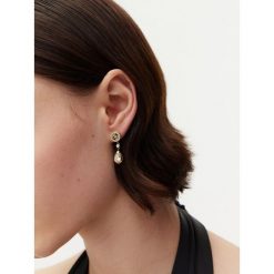 Kolczyki Guess. Żółte kolczyki Guess, złote. Za 159.99 zł.