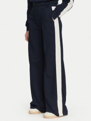 Guess Spodnie materiałowe V6YB26 K5139 Granatowy Relaxed Fit. Niebieskie spodnie dresowe Guess, xxs, z aplikacjami, z materiału. Za 434.99 zł.