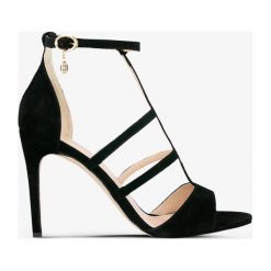 Symbiosis Felicity Sandały Zamsz Czarne buty damskie, czarny, rozmiar 6. Czarne sandały Symbiosis, bez wzorów, ze skóry, eleganckie, bez obcasa, na obcasie, bez zapięcia. W wyprzedaży za 127.49 zł.
