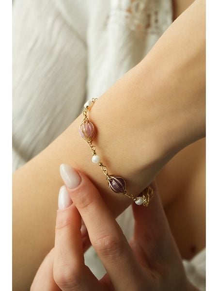 Pierres delicates Pozłacana bransoletka z agatami rozmiar: onesize. Brązowe bransoletki Pierres delicates, z agatem, pozłacane. Za 91.77 zł.