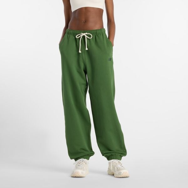 Spodnie damskie New Balance WP41513DAE – zielone. Zielone spodnie dresowe New Balance, m, bez wzorów, z bawełny. Za 379.99 zł.