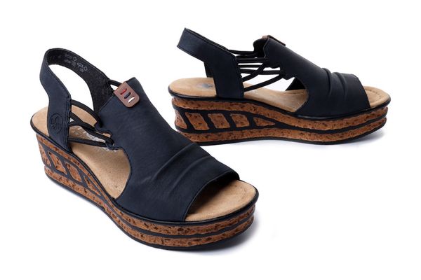 RIEKER 68175-14 blue, sandały damskie. Niebieskie sandały Rieker, bez wzorów, bez obcasa, na koturnie, bez zapięcia. Za 271.92 zł.