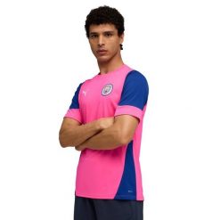 Treningowa koszulka Manchester City. Czerwone bluzki Puma, bez wzorów, sportowe, bez kołnierzyka, bez ramiączek. Za 254.00 zł.