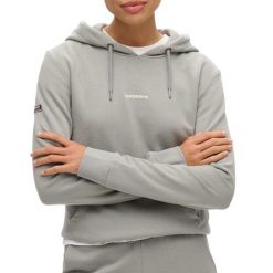 Jednokolorowa bluza z kapturem damska Superdry. Niebieskie bluzy Superdry, xl, bez wzorów, z bawełny, z kapturem. Za 318.75 zł.