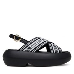 Sandały LOVE MOSCHINO. Czarne sandały Love Moschino, bez wzorów, bez obcasa, na koturnie, bez zapięcia. Za 569.99 zł.