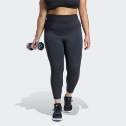 Legginsy Optime Workout 3-Stripes 7/8 (Plus size). Czarne legginsy Adidas, plus size, bez wzorów, z tkaniny, z podwyższonym stanem. Za 279.00 zł.