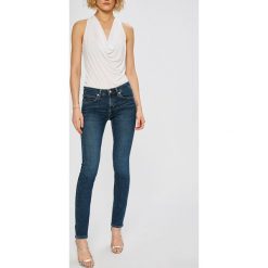 Calvin Klein Jeans - Jeansy Body. Niebieskie jeansy Calvin Klein Jeans, bez wzorów, z obniżonym stanem. W wyprzedaży za 299.90 zł.