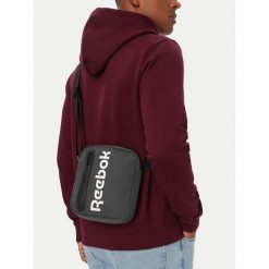 Saszetka Reebok. Szare torby na ramię Reebok, bez wzorów, młodzieżowe, bez dodatków. Za 59.99 zł.