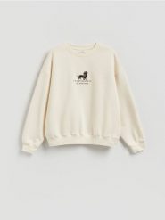 Bluza z ozdobnym haftem - kremowy. Białe bluzy Reserved, l, bez wzorów, z bawełny, bez kaptura. Za 99.99 zł.
