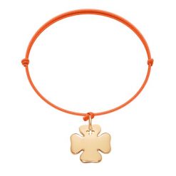 Bransoletka z pozłacaną koniczyną na cienkim pomarańczowym sznurku. Brązowe bransoletki Lilou, pozłacane. Za 149.00 zł.