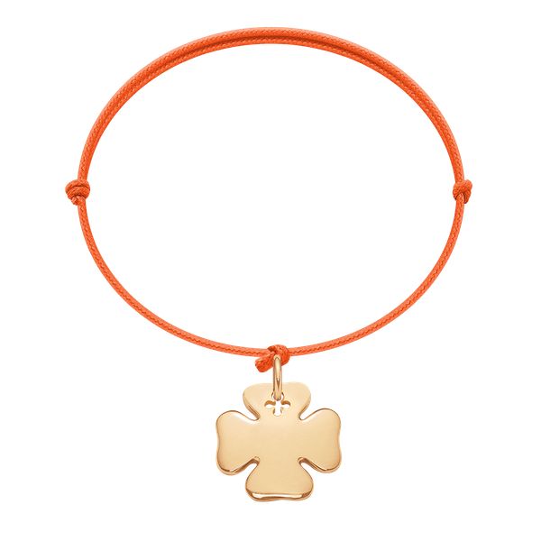 Bransoletka z pozłacaną koniczyną na cienkim pomarańczowym sznurku. Brązowe bransoletki Lilou, pozłacane. Za 149.00 zł.