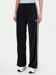 Adidas Spodnie dresowe adicolor Classic Firebird JC8245 Czarny Loose Fit. Czarne spodnie dresowe Adidas, m, bez wzorów, z dresówki. Za 259.99 zł.
