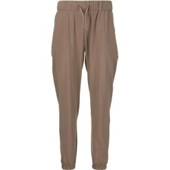 Damskie spodnie dresowe Athlecia Austberg. Brązowe spodnie dresowe Athlecia, bez wzorów, z dresówki. Za 193.50 zł.