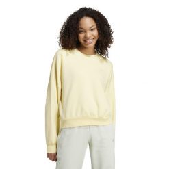 Bluza damska ADIDAS Gym & Pilates. Żółte bluzy Adidas, m, bez wzorów, z bawełny, bez kaptura. W wyprzedaży za 129.99 zł.